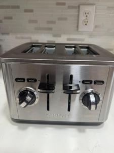 a toaster oven sitting on top of a counter at Luxury&Home in Tampa