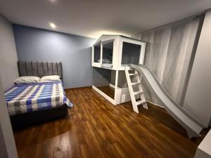 En eller flere senge i et værelse på Cerros de Yerbabuena