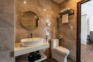 Et badeværelse på Odyssey Hotel 2, Tours & Motorbikes Rental + 36 billeder