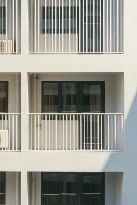 an apartment building with balconies and windows at City Clou in Cebu City