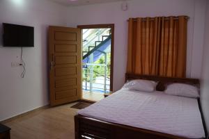 Postel nebo postele na pokoji v ubytování Carmel Building