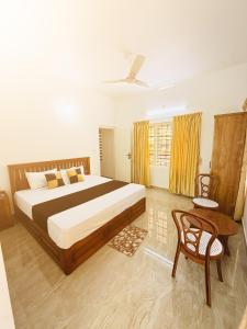 Ένα ή περισσότερα κρεβάτια σε δωμάτιο στο Paradise Premium Villa Munnar