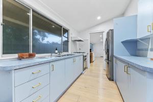 Køkken eller tekøkken på Foreshore Sunset Retreat