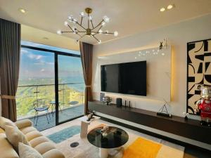 TV a/nebo společenská místnost v ubytování Condotel CSJ Tower Vũng Tàu - Căn hộ du lịch cạnh biển