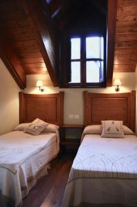 מיטה או מיטות בחדר ב-Casa Montse