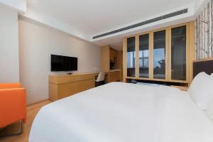 Et tv og/eller underholdning på Starway Hotel Suzhou Shishan Road High-Tech Plaza + 10 billeder