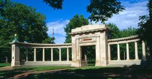 a large white building with columns and a gate at The Hotel at Oberlin in Oberlin