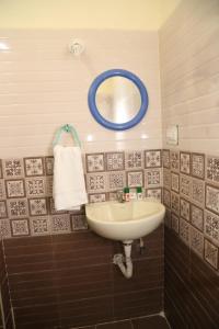 Ένα μπάνιο στο Sudha Grand Guestinn