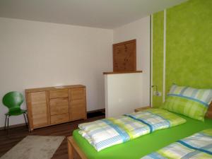 Ein Bett oder Betten in einem Zimmer der Unterkunft Gasthof Christine Enne