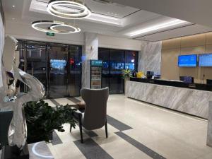 Ο χώρος του λόμπι ή της ρεσεψιόν στο City Comfort Inn Dongguan Shijie Jiarong Shopping Plaza