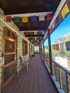 En balkon eller terrasse på Ganga Homstay Rakchham