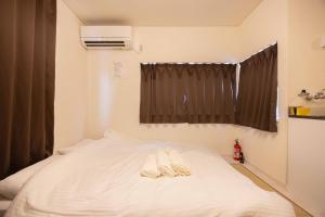 Postel nebo postele na pokoji v ubytování Kawagoe good place House + 31 fotografií