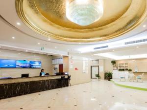 Μια τηλεόραση ή/και κέντρο ψυχαγωγίας στο GreenTree Alliance Hotel Yancheng Engineering College Dayangwan Scenic Area