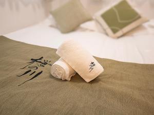 Ένα ή περισσότερα κρεβάτια σε δωμάτιο στο 桜の川50 東京晴空塔10分钟本所吾妻橋駅5分钟5人房丨 Tokyo skytree 10 mins Honjo Azumabashi 5 minutes5 people +50 φωτογραφίες