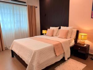 Postel nebo postele na pokoji v ubytování Villa Yelma