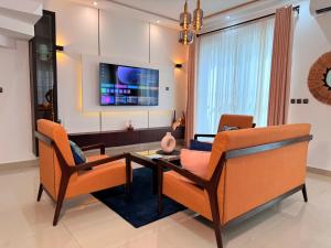 TV a/nebo společenská místnost v ubytování Villa Yelma