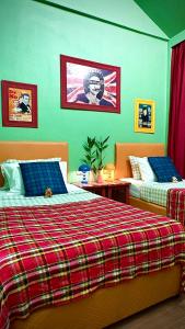 Postel nebo postele na pokoji v ubytování CenterPoint Thong Sala