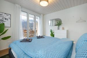 Ένα ή περισσότερα κρεβάτια σε δωμάτιο στο Mountain view with balcony and free parking