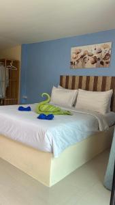 Ένα ή περισσότερα κρεβάτια σε δωμάτιο στο Kim house Koh Jum +33 φωτογραφίες