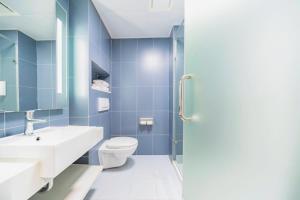 Et badeværelse på Hanting Hotel Shanghai Wujing East China Normal University + 19 billeder