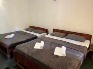 Кровать или кровати в номере Serendib House - Sinharaja +9 фотографий