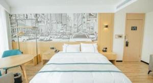 Ένα ή περισσότερα κρεβάτια σε δωμάτιο στο City Comfort Inn Chongqing Yongchuan Xuefu Avenue Wanda