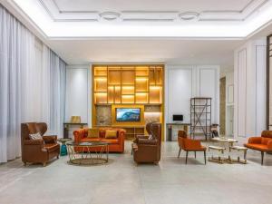 Un lugar para sentarse en Vienna Hotel Qinghai Dachaidan