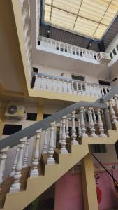 a view of a staircase in a building at El hostal de Uriel in Izalco