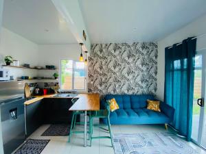 Kuchyň nebo kuchyňský kout v ubytování Hina Lodge - Bungalow Hina + 11 fotografií