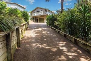 Imagine din galeria proprietății Sunset Sanctuary- Stay Waiheke în Omiha +35 fotografii