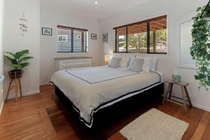 Ένα ή περισσότερα κρεβάτια σε δωμάτιο στο The Cove at Little O - Stay Waiheke +6 φωτογραφίες