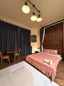 Postel nebo postele na pokoji v ubytování Looking homestay