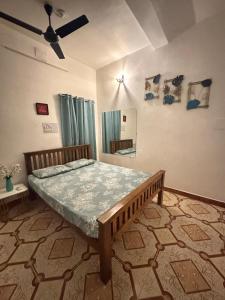 En eller flere senge i et værelse på Casa Fiesta Pondy