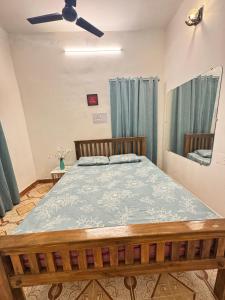 En eller flere senge i et værelse på Casa Fiesta Pondy