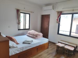 Postel nebo postele na pokoji v ubytování North Face Studio + 15 fotografií