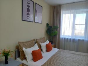 Ένα ή περισσότερα κρεβάτια σε δωμάτιο στο Звёздный Оазис