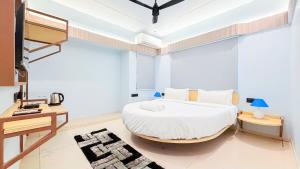 Postel nebo postele na pokoji v ubytování Hotel Nova Wave