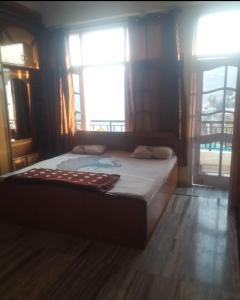 Кровать или кровати в номере Harmony Homestay