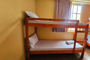 Postel nebo postele na pokoji v ubytování Barelle Hostel, Coffee and Wine Bar