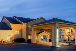 a large building with a roof at AmericInn by Wyndham Frankfort IN in Frankfort +16 photos