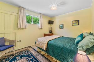 Postel nebo postele na pokoji v ubytování Trailside Escape - Lake Taupo Holiday Home