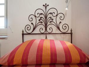 Postel nebo postele na pokoji v ubytování Luxurious Apartment in Rocca Grimalda with Garden