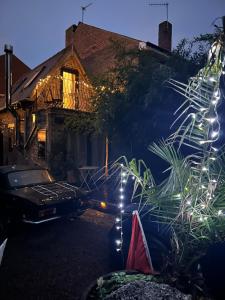 a car parked in front of a house at night at Keepers Lodge in Nottingham +38 photos