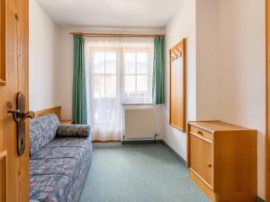 Ένα ή περισσότερα κρεβάτια σε δωμάτιο στο Beautiful apartment in Mittersill with balcony