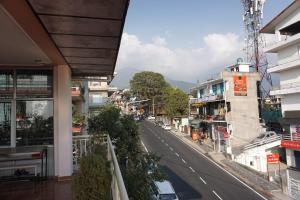 a view of a city street from a building at Guler House in Jāmb