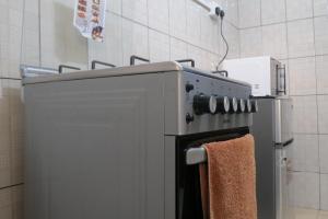 Kuchyň nebo kuchyňský kout v ubytování Gratia Pad Nanyuki