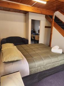 Postelja oz. postelje v sobi nastanitve Papakura Crusoe's motor lodge