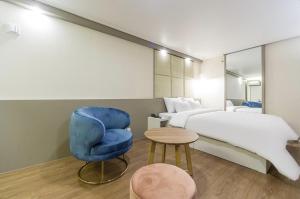 Giường trong phòng chung tại Icon Hotel Gunsan +135 ảnh