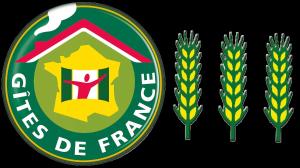 a group of three logos for a field of wheat at A la Grenouille du Jura in Bellignat