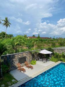 Πισίνα στο ή κοντά στο Omnni Villa Borobudur